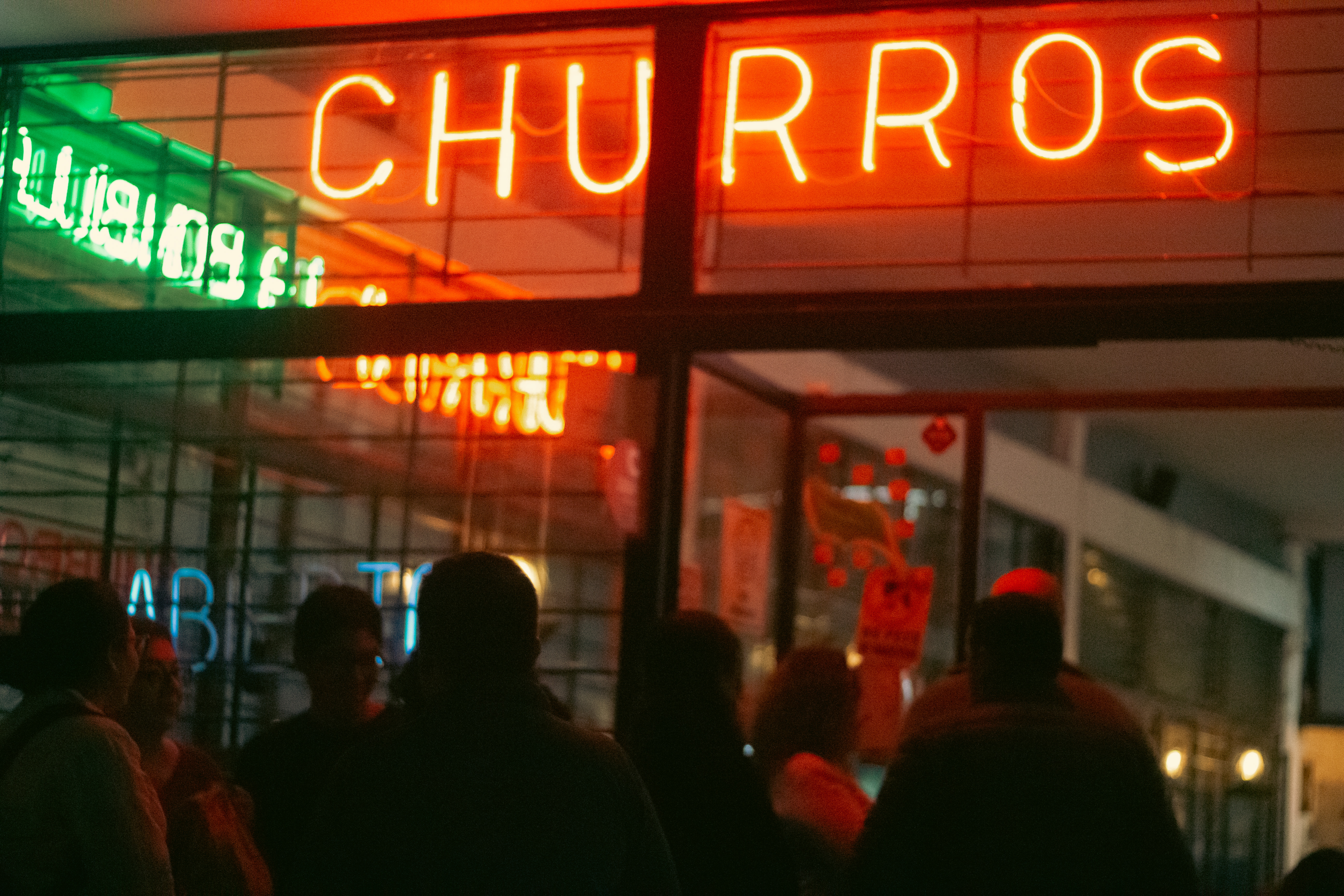 Churro store with a long line in Guadalajara